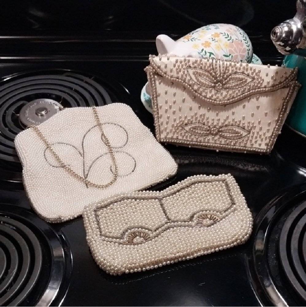 Cream Clutch with Floral Embellishments and Shimmery Finish